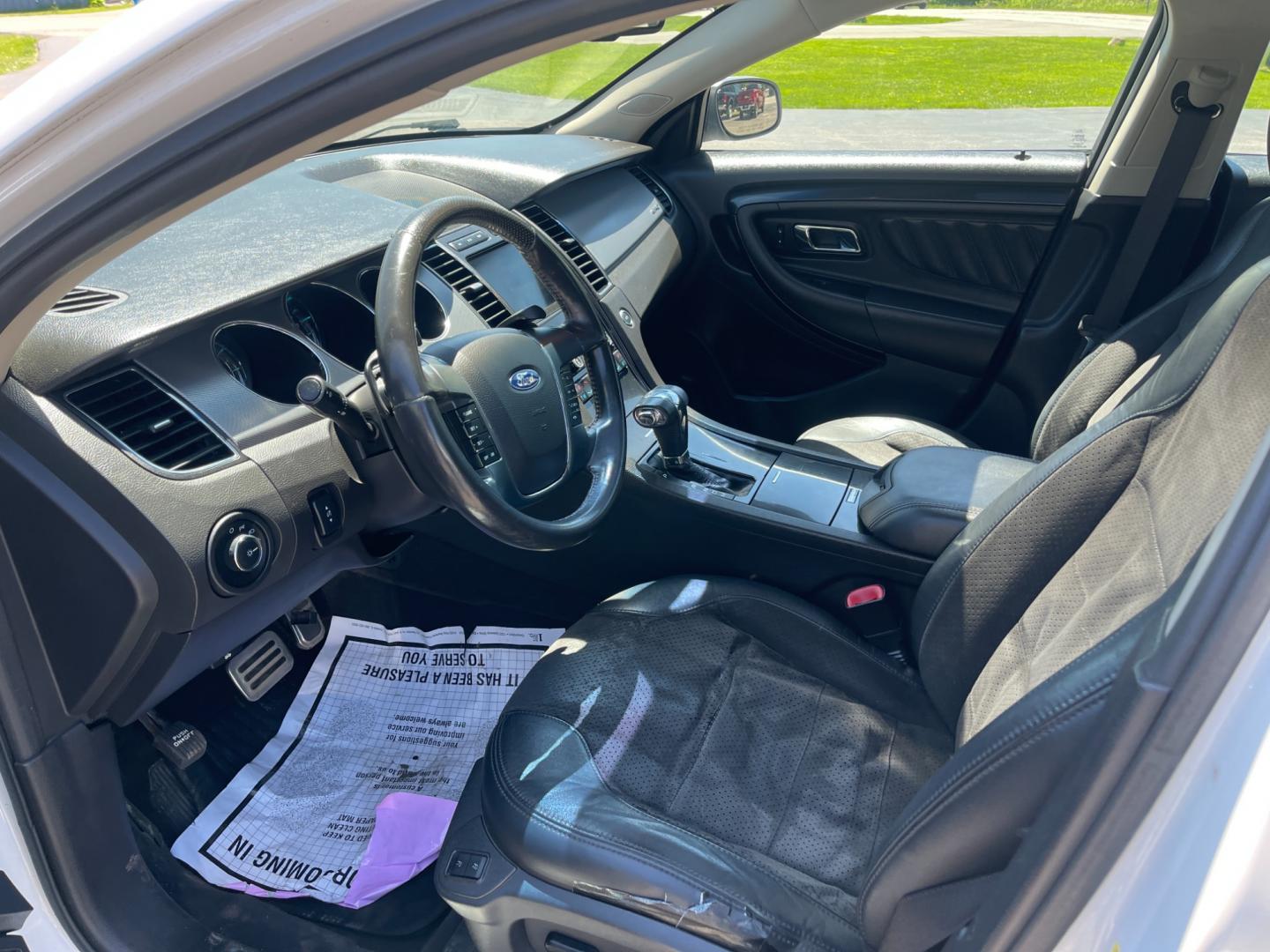 2010 White /Black Ford Taurus SHO (1FAHP2KT3AG) with an 3.5L V6 DOHC 24V TWIN TURBO engine, 6-Speed Automatic transmission, located at 11115 Chardon Rd. , Chardon, OH, 44024, (440) 214-9705, 41.580246, -81.241943 - This 2010 Ford Taurus SHO AWD is a high-performance variant of the Taurus sedan, powered by a potent 3.5L EcoBoost V6 engine that produces 365 hp and enables a 0-60 mph time of 5.2 seconds. It features an advanced AWD system, a 6-speed automatic transmission, and the SHO Performance Package. Notable - Photo#15